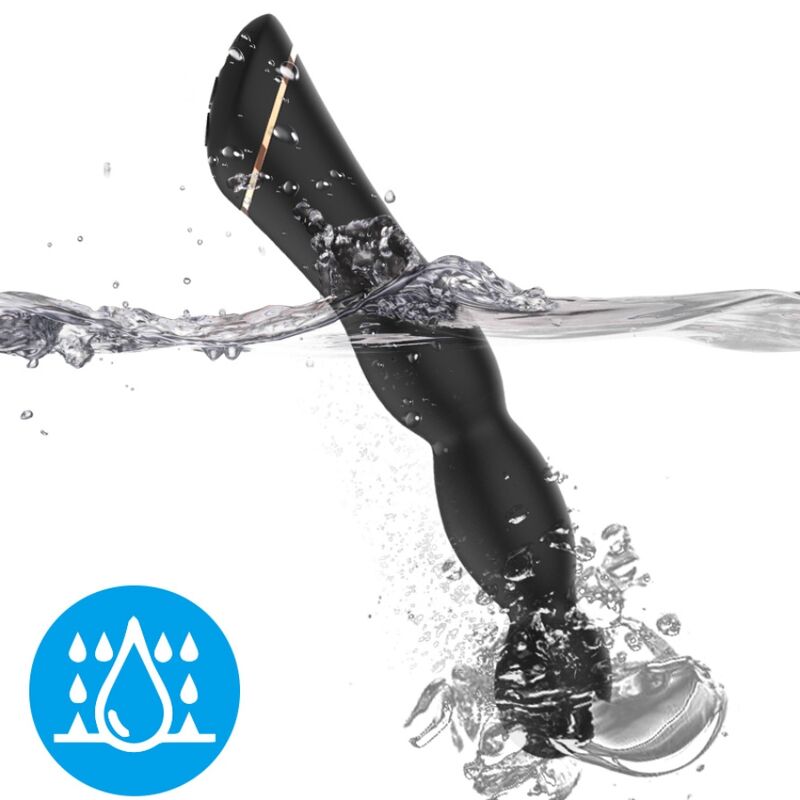 Vibromasseur segmenté Bambu noir d'Armony plongé dans l'eau, pictogramme étanche